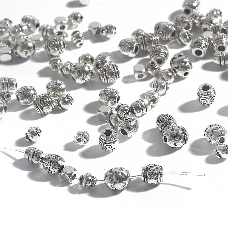 Irregular alloy spacer beads