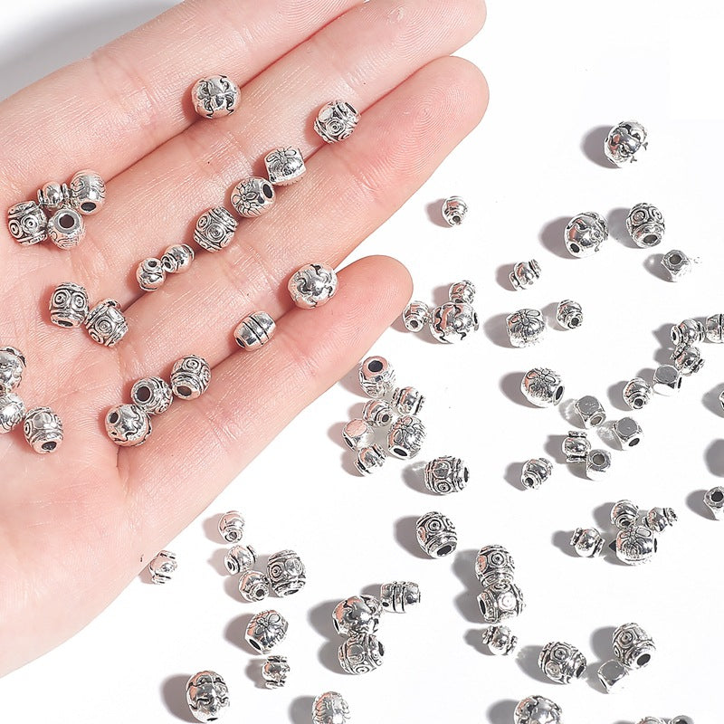 Irregular alloy spacer beads