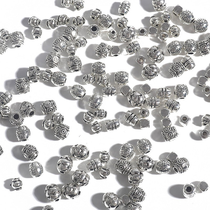 Irregular alloy spacer beads