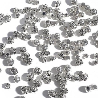 Irregular alloy spacer beads