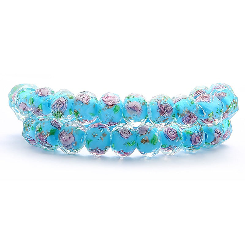 Faceted glass wheel beads