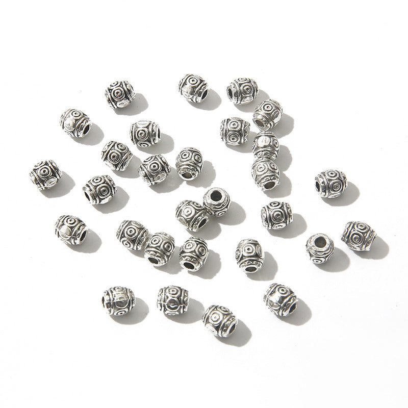 Irregular alloy spacer beads