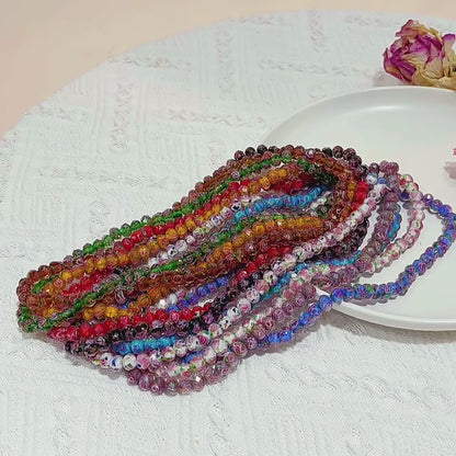 Faceted glass wheel beads